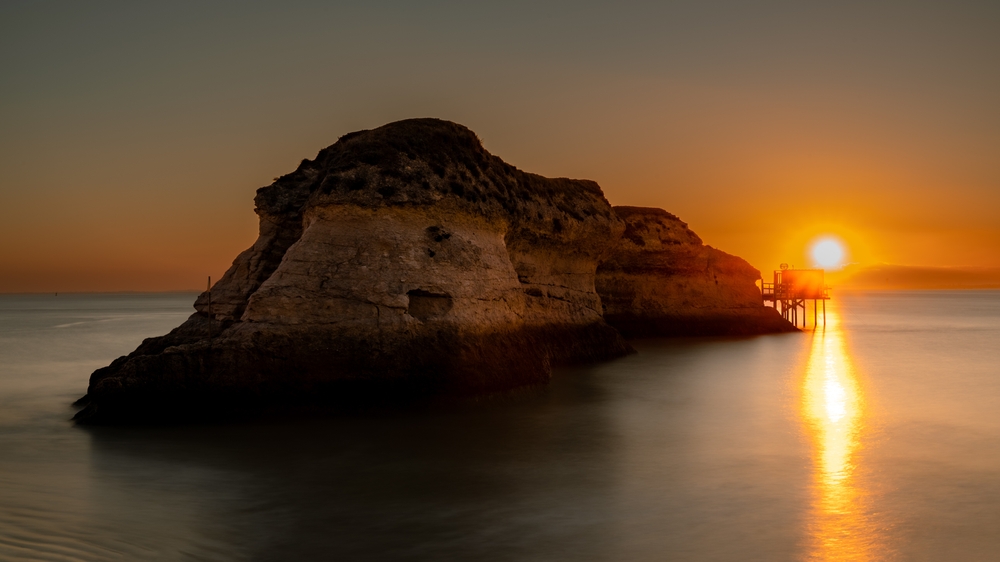 Meschers La Couronne Rock Vergnes Beach at sunset